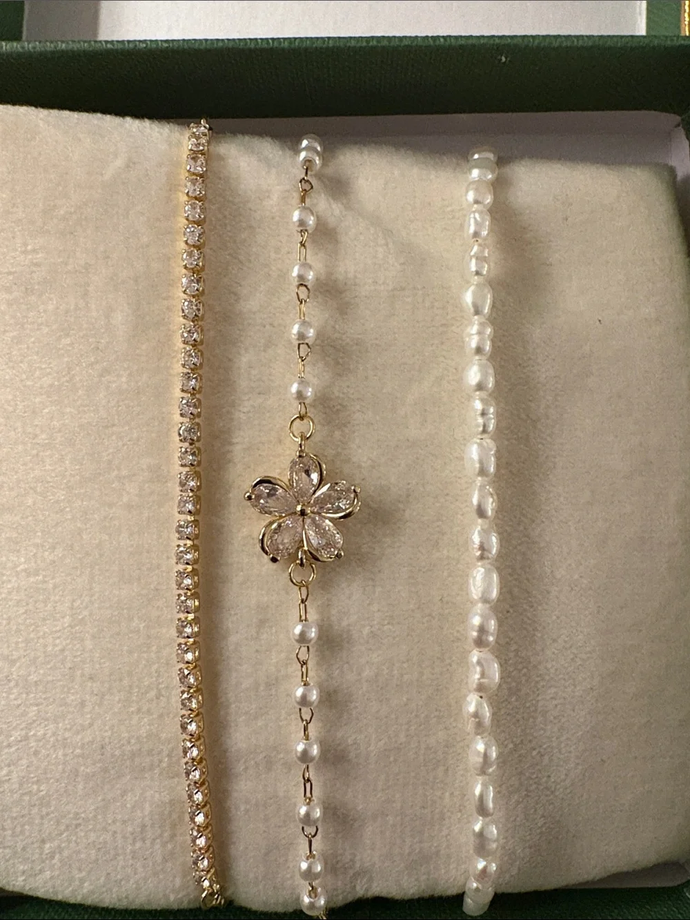 Gold Plated Natural pearls and Cz Flower 3 Bolo bracelets. From India.